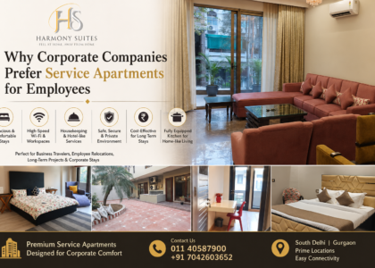 Corporate employee relaxing in a luxury service apartment with workspace and living area at Harmony Suites